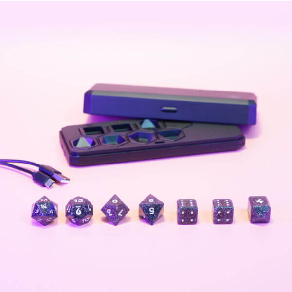 Set of 7 lit Onyx Black dice with a rainbow of colors across all faces. Set Includes: 1 D20, 1 D12, 1 D10, 1 D8, 2 Pipped D6, 1 D4. Onyx Black colorway is a fully opaque black resin with no glitter. The numbers or symbols are painted pale white.