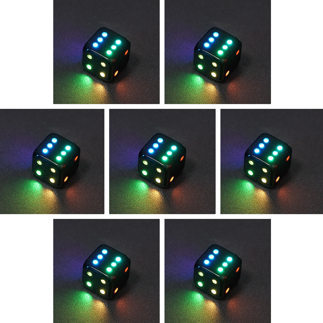 Collage of 7 lit Onyx Black Pipped D6 with a rainbow of colors across each face. Onyx Black colorway is a fully opaque black with no glitter, creating an almost matte style. The numbers or symbols are pale white.