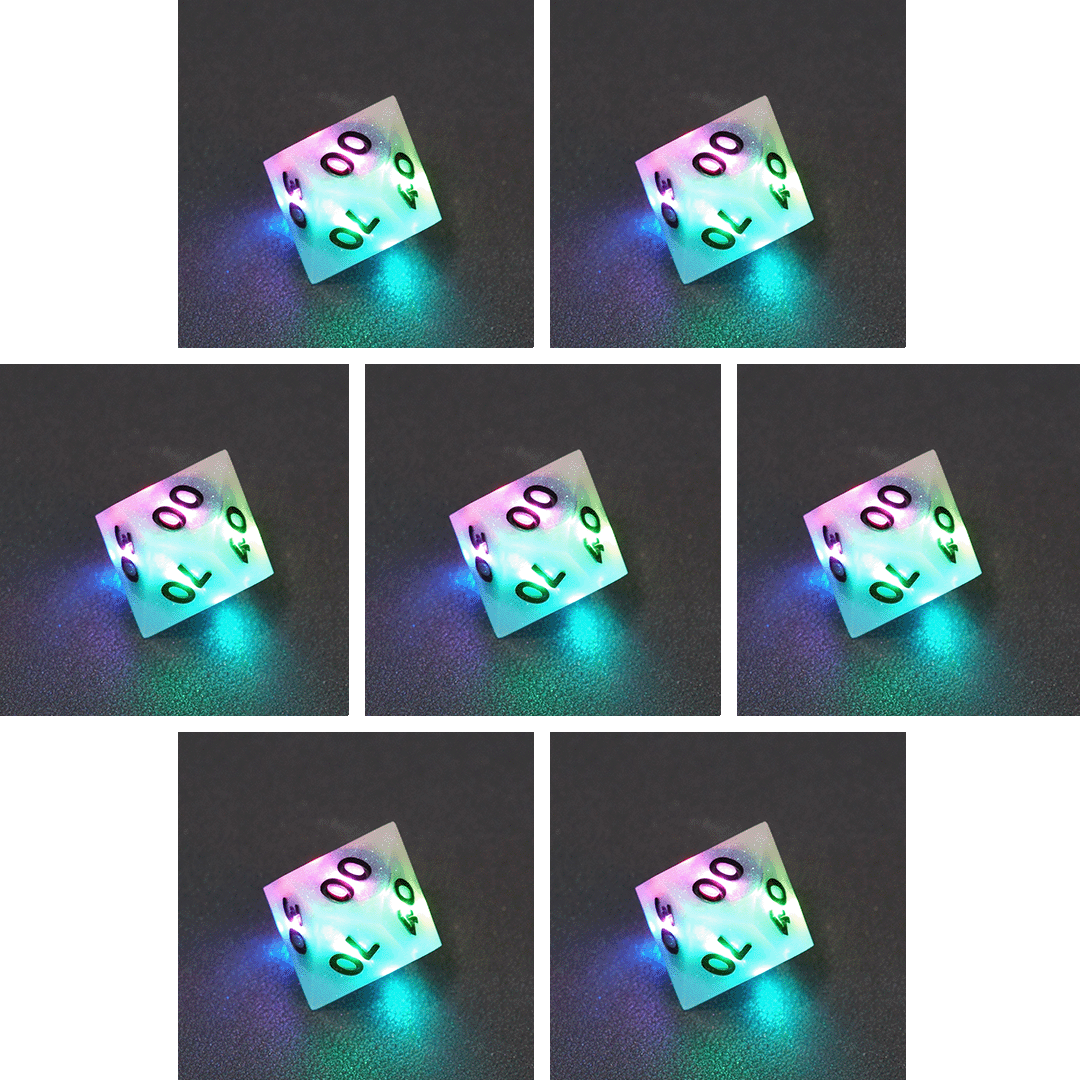 Collage of 7 lit Aurora Sky D00 with a rainbow of colors across each face. Aurora Sky colorway is a mostly translucent white resin base packed with small blue and silver glitter throughout. The numbers or symbols are painted metallic black.