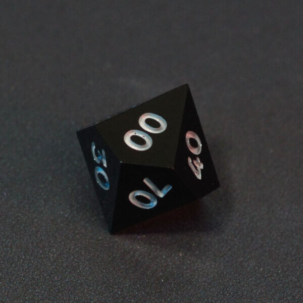 Collage of 7 lit Onyx Black D00 with a rainbow of colors across each face. Onyx Black colorway is a fully opaque black with no glitter, creating an almost matte style. The numbers or symbols are pale white.