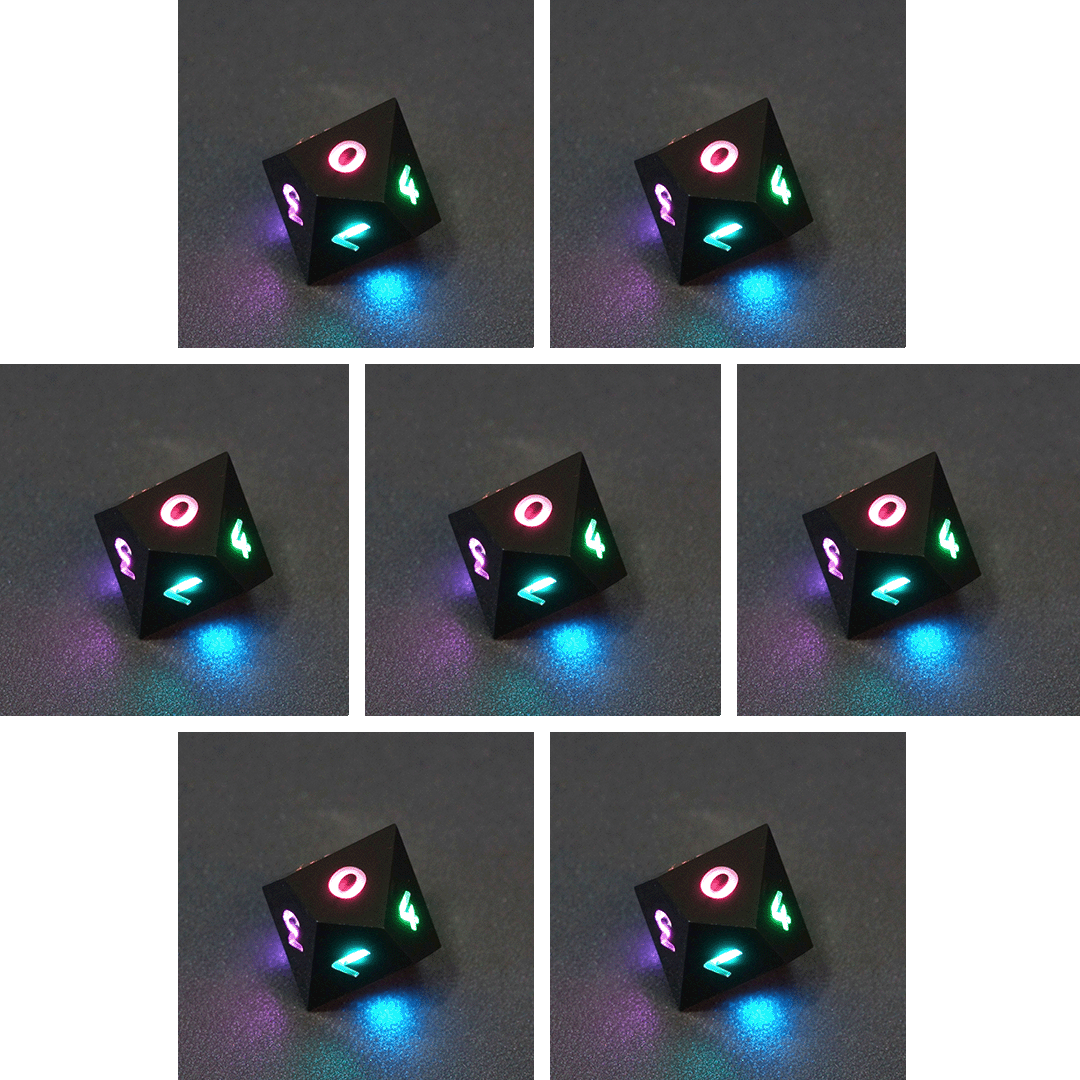 Collage of 7 lit Onyx Black D10 with a rainbow of colors across each face. Onyx Black colorway is a fully opaque black with no glitter, creating an almost matte style. The numbers or symbols are pale white.