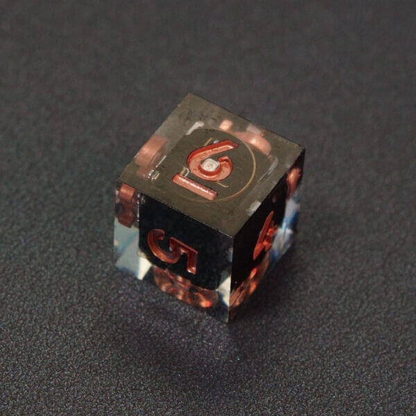 Collage of 7 lit Clear D6 with a rainbow of colors across each face. Clear colorway is fully transparent resin allowing internal circuit board to be visible. The numbers or symbols are painted metallic copper.