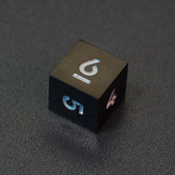 Collage of 7 lit Onyx Black D6 with a rainbow of colors across each face. Onyx Black colorway is a fully opaque black with no glitter, creating an almost matte style. The numbers or symbols are pale white.