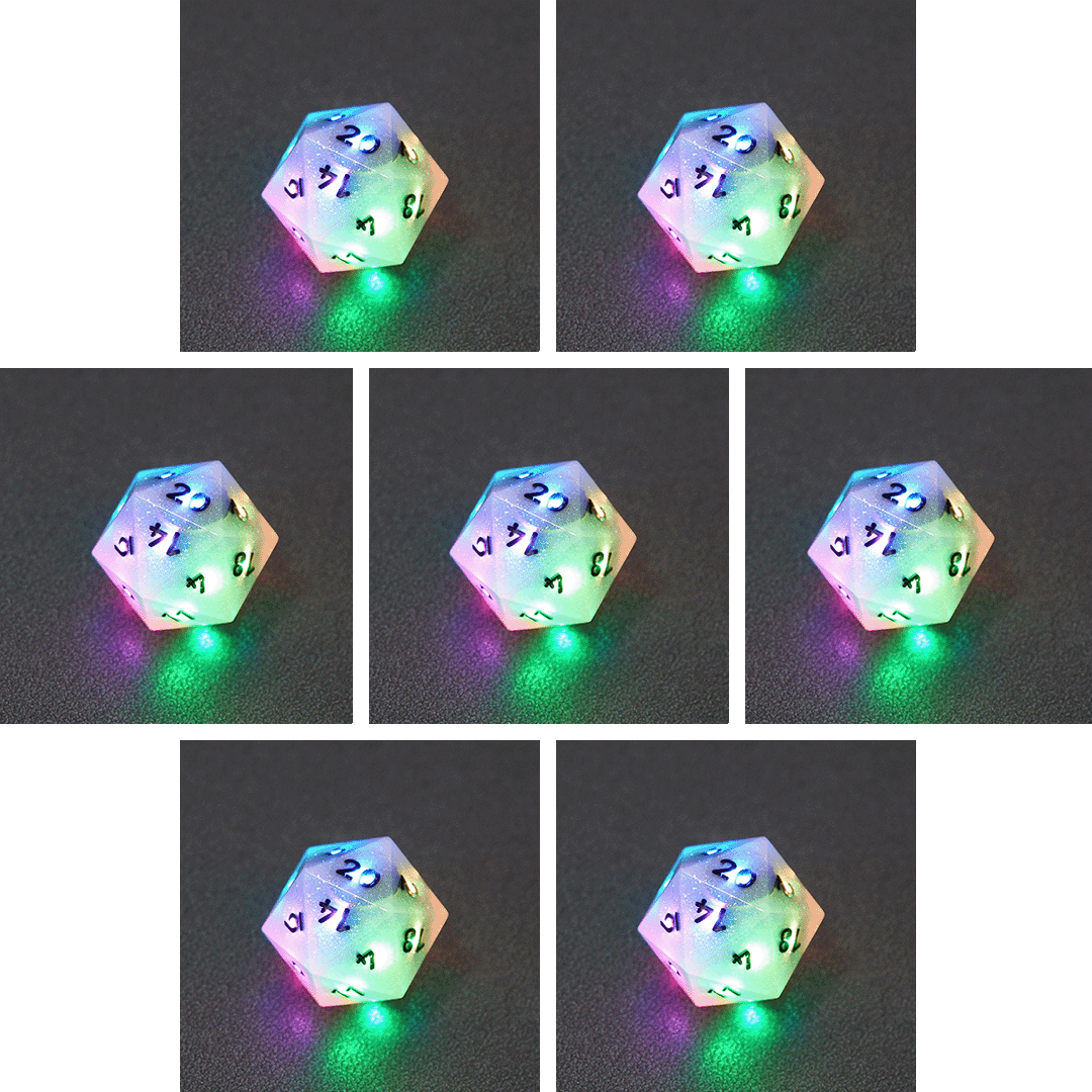 Collage of 7 lit Aurora Sky D20 with a rainbow of colors across each face. Aurora Sky colorway is a mostly translucent white resin base packed with small blue and silver glitter throughout. The numbers or symbols are painted metallic black.