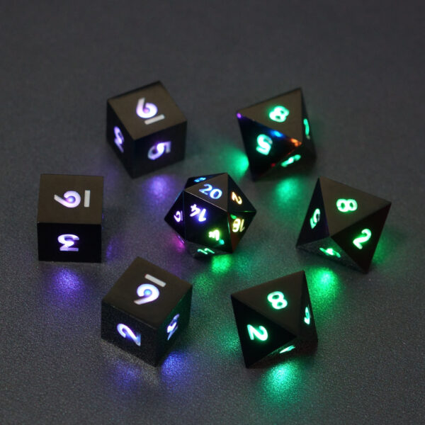 Set of 7 lit Onyx Black dice with a rainbow of colors across all faces. Set Includes: 1 D20, 3 D8, 3 D6. Onyx Black colorway is a fully opaque black resin with no glitter. The numbers or symbols are painted pale white.