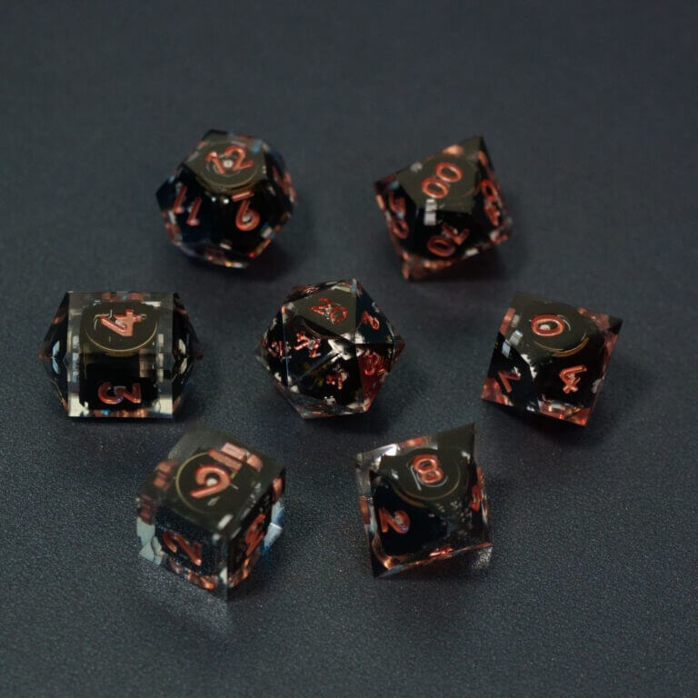 Set of 7 lit Clear dice with a rainbow of colors across all faces. Set Includes: 1 D20, 1 D12, 1 D00, 1 D10, 1 D8, 1 D6, 1 D4. Clear colorway is fully transparent resin allowing internal circuit board to be visible. The numbers or symbols are painted metallic copper.