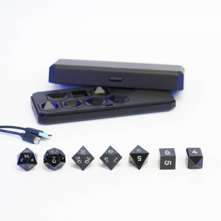 Set of 7 lit Onyx Black dice with a rainbow of colors across all faces. Set Includes: 1 D20, 1 D12, 1 D00, 1 D10, 1 D8, 1 D6, 1 D4. Onyx Black colorway is a fully opaque black resin with no glitter. The numbers or symbols are painted pale white.