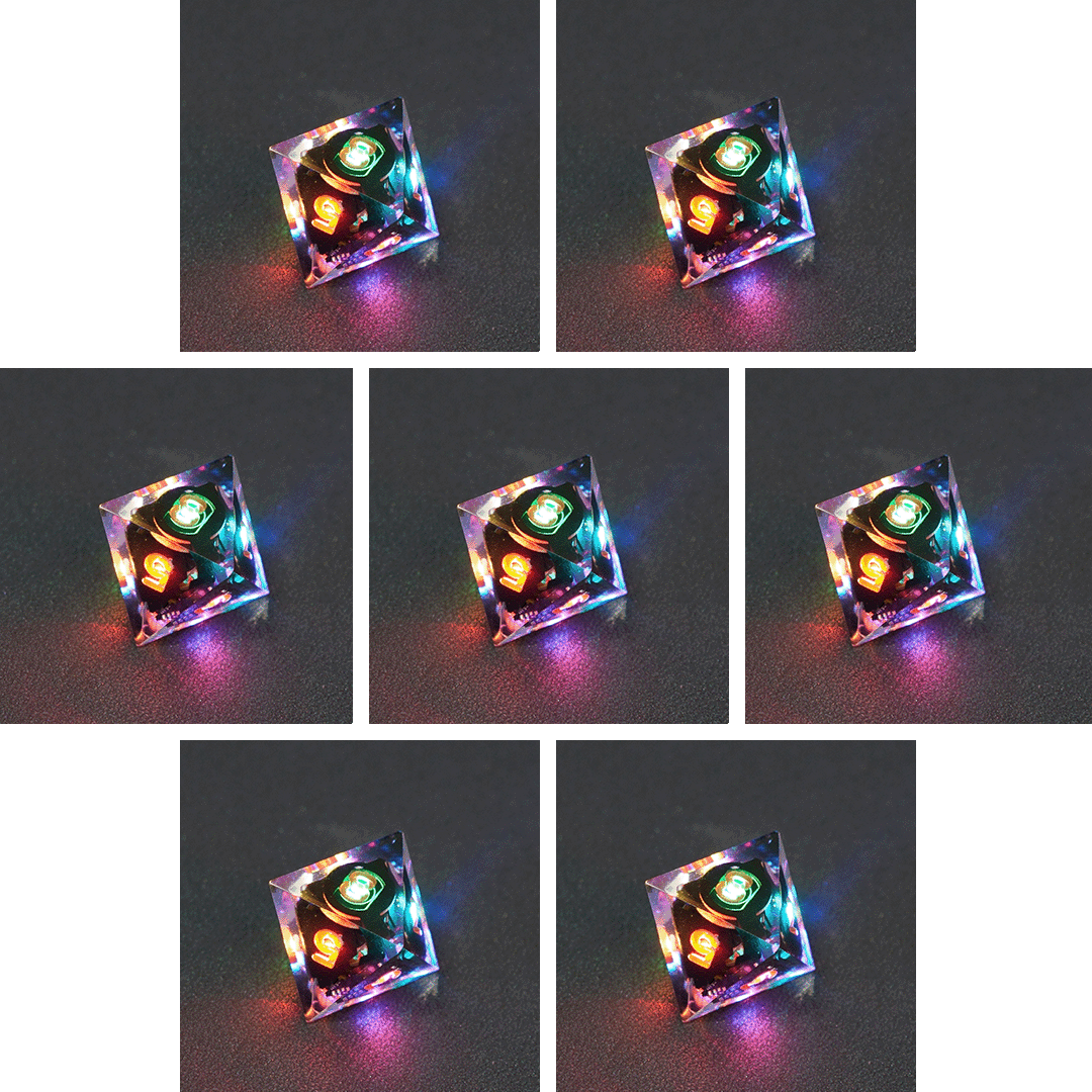 Collage of 7 lit Clear D8 with a rainbow of colors across each face. Clear colorway is fully transparent resin allowing internal circuit board to be visible. The numbers or symbols are painted metallic copper.