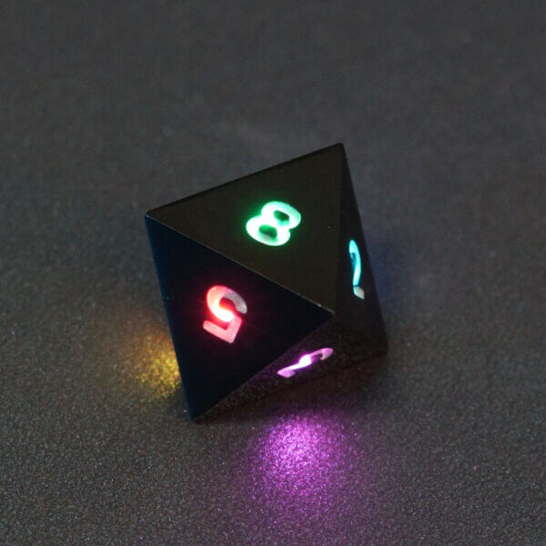 Collage of 7 lit Onyx Black D8 with a rainbow of colors across each face. Onyx Black colorway is a fully opaque black with no glitter, creating an almost matte style. The numbers or symbols are pale white.