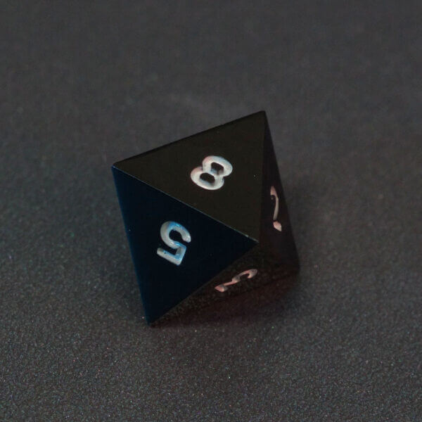 Collage of 7 lit Onyx Black D8 with a rainbow of colors across each face. Onyx Black colorway is a fully opaque black with no glitter, creating an almost matte style. The numbers or symbols are pale white.