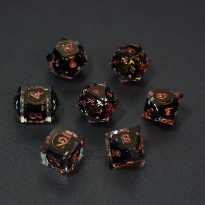 Set of 7 lit Clear dice with a rainbow of colors across all faces. Set Includes: 2 D20, 1 D12, 1 D10, 1 D8, 1 D6, 1 D4. Clear colorway is fully transparent resin allowing internal circuit board to be visible. The numbers or symbols are painted metallic copper.