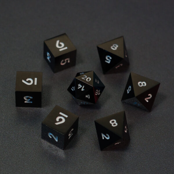 Set of 7 unlit Onyx Black dice. Set Includes: 1 D20, 3 D8, 3 D6. Onyx Black colorway is a fully opaque black resin with no glitter. The numbers or symbols are painted pale white.