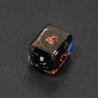 Unlit Clear D4 in a crystal shape. Clear colorway is fully transparent resin allowing internal circuit board to be visible. The numbers or symbols are painted metallic copper.