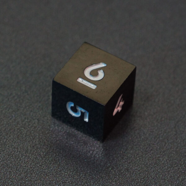 Unlit Onyx Black D6. Onyx Black colorway is a fully opaque black resin with no glitter. The numbers or symbols are painted pale white.