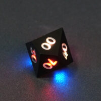 Lit Onyx Black D00 with red and blue lights across each face. Onyx Black colorway is a fully opaque black resin with no glitter. The numbers or symbols are painted pale white.