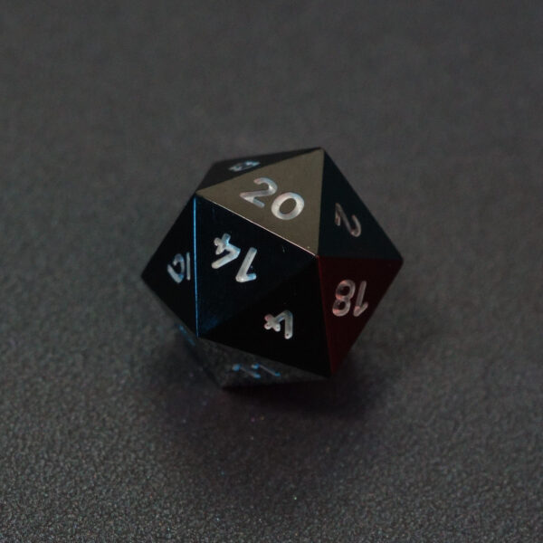 Unlit Onyx Black D20. Onyx Black colorway is a fully opaque black resin with no glitter. The numbers or symbols are painted pale white.