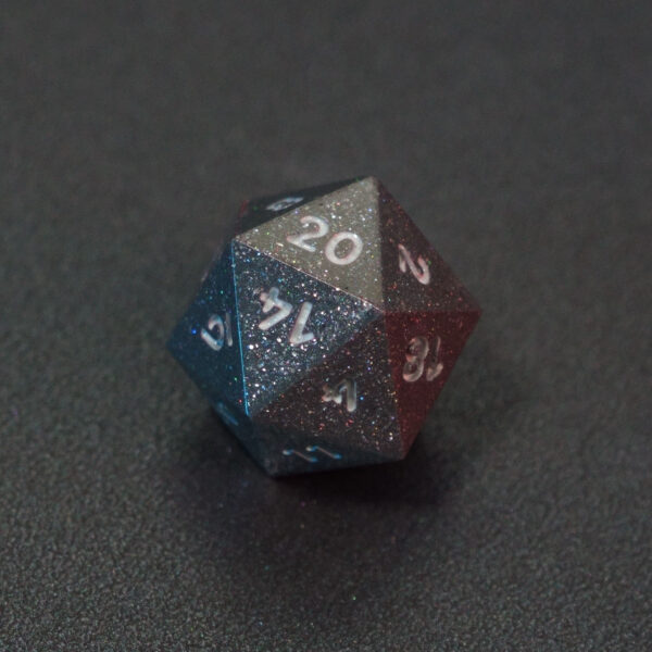 Unlit Hematite Grey D20. Hematite Grey colorway is a fully opaque medium tone silver resin packed with rainbow glitter of various sizes. The numbers or symbols are painted pale white.
