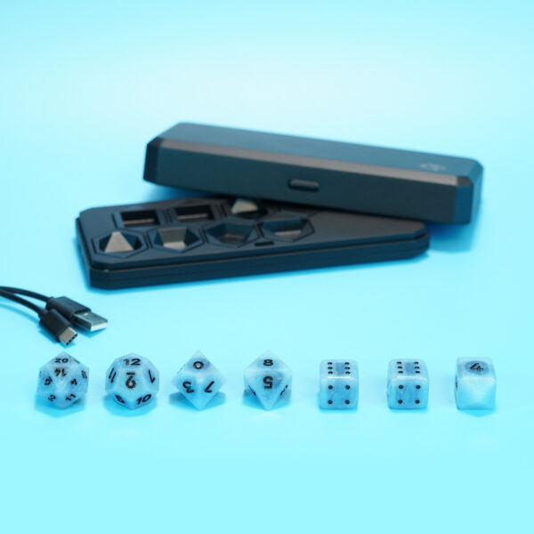 Unlit Aurora Sky Board Gamer set lined up in front of a Large Charging Case and USB Cable.