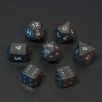 Set of 7 unlit Hematite Grey dice. Set Includes: 1 D20, 1 D12, 1 D10, 1 D8, 2 Pipped D6, 1 D4. Hematite Grey colorway is a fully opaque medium tone silver resin packed with rainbow glitter of various sizes. The numbers or symbols are painted pale white.