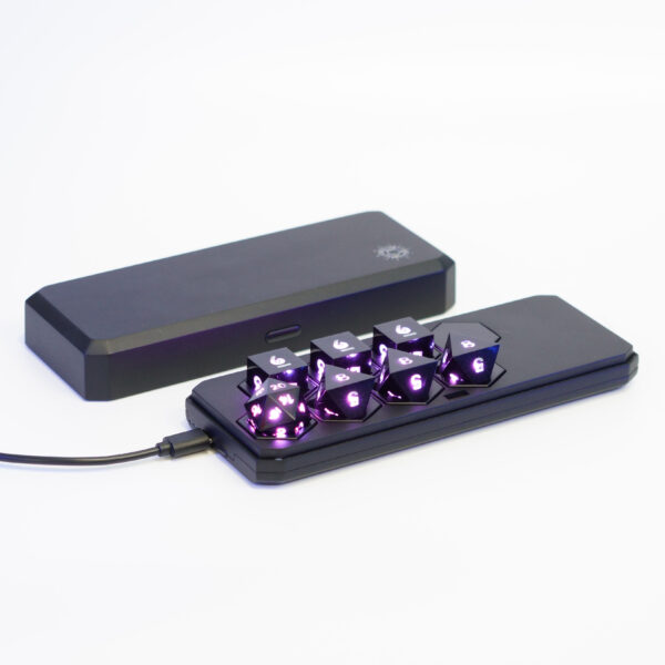 Lit Onyx Black Power set placed inside a Large Charging Case with a USB cable plugged into the side of the case.